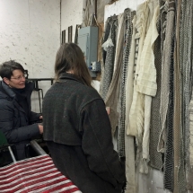 Lisa Bertoldi and Peggy Hart looking at pattern samples in Peggy's studio